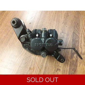 1983-85 Honda CB650SC Left Brake Caliper and Bracket